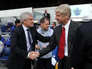 Arsene Wenger and Mark Hughes: A Pre-Match Handshake Between Queens Park Rangers and Arsenal Managers (2011-12)