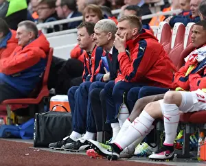 Arsene Wenger and Per Mertesacker on Arsenal Bench during Arsenal vs Watford, Premier League 2015-16