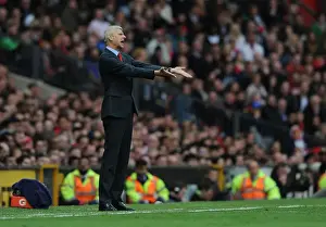 Manchester United V Arsenal 2014-15 Prints: Arsene Wenger at Old Trafford: A Premier League Battle between Arsenal and Manchester United