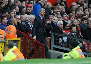 Manchester United V Arsenal 2014-15 Prints: Arsene Wenger at Old Trafford: A Premier League Showdown between Manchester United and Arsenal