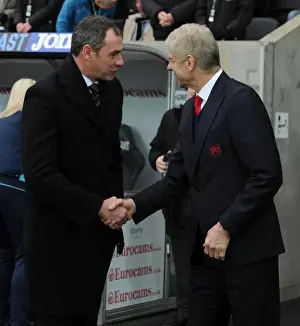 Swansea City V Arsenal - 2016-17 Prints: Arsene Wenger and Paul Clement Pre-Match Handshake: Swansea City vs