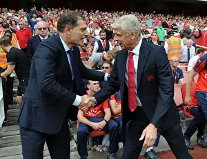 Arsenal V West Ham United 2015-16 Prints: Arsene Wenger and Slaven Bilic: Pre-Match Handshake Between Arsenal and West Ham United Managers