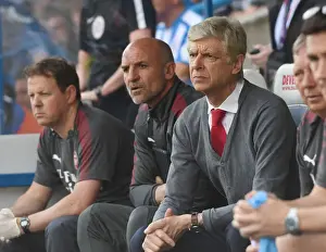 Arsene Wenger and Steve Bould: Focused on the Field during Arsenal's Match against Huddersfield Town, 2018