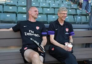 Images Dated 29th July 2012: Arsene Wenger and Steve Bould Share a Light-Hearted Moment Before Kitchee FC vs