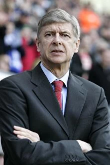 Images Dated 10th March 2008: Arsene Wenger: Unyielding at the Helm During the 0-0 Stalemate Against Wigan Athletic