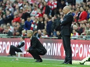 Images Dated 12th April 2014: Arsene Wenger and Uwe Rosler Face Off in FA Cup Semi-Final: Arsenal vs. Wigan Athletic (2014)