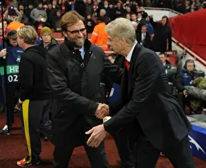 Arsene Wenger vs. Jurgen Klopp: A Football Rivalry Unfolds - Arsenal vs. Borussia Dortmund in the UEFA Champions League (2014)