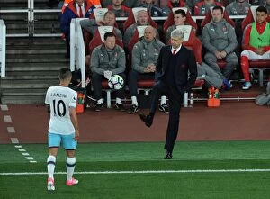 Images Dated 5th April 2017: Arsene Wenger vs. Manuel Lanzini: A Battle in the Premier League between Arsenal and West Ham United