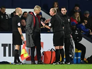 West Bromwich Albion V Arsenal 2017-18 Prints: Arsene Wenger vs. Mike Dean: A Contentious Face-off during Arsenal's Match at West Bromwich Albion (2017-18)
