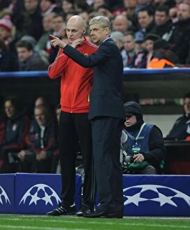 Images Dated 11th March 2014: Arsene Wenger's Intense Confrontation with the Referee at Bayern Munich: Arsenal vs