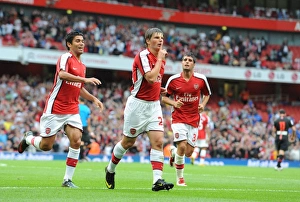 Arsene Wenger's Men: Arshavin, Eduardo, and Merida Celebrate Arsenal's First Goal Against Athletico Madrid, Emirates Cup 2009