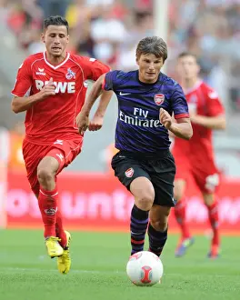 Cologne V Arsenal 2012-13 Prints: Arshavin Clashes with Cologne: Pre-Season Friendly Showdown