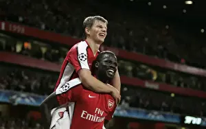 Arshavin Andrey Prints: Arshavin and Eboue: Arsenal's Unstoppable Duo Celebrates 2-0 Over Olympiacos in Champions League