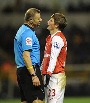 Wolverhampton Wanderers v Arsenal 2010-11 Collection: Arshavin Teases Ref Halsey During Arsenal's 2-0 Win Over Wolverhampton Wanderers