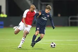 Arshavin Andrey Prints: Arshavin vs. Poulsen: 1-1 Stalemate in the Champions League Clash between AZ Alkmaar and Arsenal