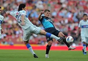 Arsenal V Boca Juniors 2011-12 Prints: Arshavin vs. Roncaglia: Clash of the Stars in Arsenal v Boca Juniors Emirates Cup Match