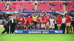 The Arsneal squad celebrate the FA Cup Final win after the match The Arsneal squad celebrate the FA Cup Final win after the match