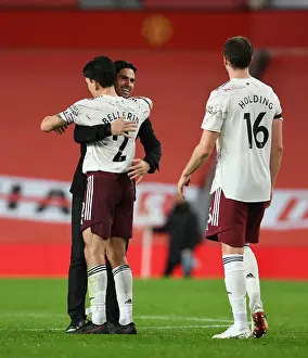 Arteta and Bellerin: Arsenal's Victory at Old Trafford Amidst Empty Stands (Manchester United vs Arsenal, 2020-21)