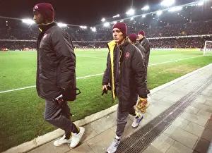 FC Thun V Arsenal Prints: Arturo Lupoli (Arsenal) makes his way to the substitutes bench after half time