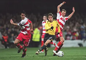 Arturo Lupoli (Arsenal) Steve Forster and Ricky Ravenhill (Doncaster)