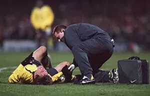 Arturo Lupoli (Arsenal) is treated by Physio Gary Lewin