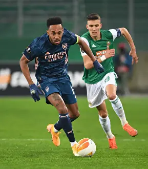 Rapid Vienna V Arsenal 2020-21 Prints: Aubameyang Breaks Past Rapid Wien: Arsenal's Europa League Victory