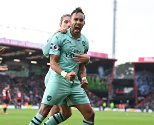AFC Bournemouth V Arsenal 2018-19 Prints: Aubameyang Scores Brace: Arsenal Triumphs Over Bournemouth in Premier League Clash (2018-19)