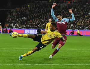 West Ham United V Arsenal 2019-20 Prints: Aubameyang Scores Third: Arsenal Triumphs Over West Ham in Premier League Clash