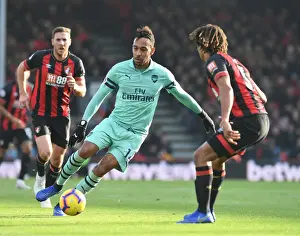 AFC Bournemouth V Arsenal 2018-19 Prints: Aubameyang vs. Ake: Intense Battle in AFC Bournemouth vs. Arsenal FC Premier League Clash