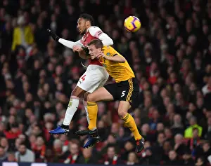 Arsenal V Wolverhampton Wanderers 2018-19 Prints: Aubameyang vs. Bennett: Intense Clash Between Arsenal's Star Striker and Wolves Defender