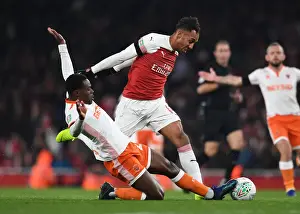 Arsenal V Blackpool Carabao Cup 2018-19 Prints: Aubameyang vs Bola: A Fierce Face-off in Arsenal's Carabao Cup Showdown