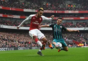 Arsenal V Southampton 2017-18 Prints: Aubameyang vs. Cedric: Intense Battle at Emirates Stadium - Arsenal vs