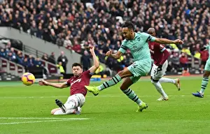 West Ham United V Arsenal 2018-19 Prints: Aubameyang vs. Cresswell: Intense Moment from the West Ham United vs