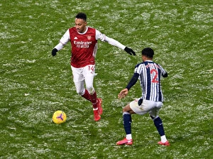 Images Dated 3rd January 2021: Aubameyang vs Furlong: Arsenal's Pierre-Emerick Takes on West Bromwich Albion's Darnell in Premier