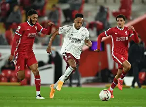Liverpool V Arsenal 2020-21 Prints: Aubameyang vs. Gomez: A Riveting Rivalry Unfolds at Anfield in the 2020-21 Premier League Clash
