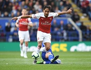 Leicester City v Arsenal 2018-19 Collection: Aubameyang vs Maddison: Intense Battle in Leicester City vs Arsenal FC Premier League Clash