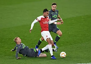 Arsenal V Sporting Clube De Portugal 2018-19 Prints: Aubameyang vs Mathieu: Intense Moment in Arsenal's Europa League Clash with Sporting CP