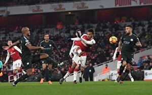 Arsenal v Manchester City 2017-18 Collection: Aubameyang vs Otamendi-Kompany: Intense Moment at Arsenal vs Manchester City, Premier League 2017-18
