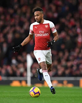 Arsenal v Huddersfield Town - 2018-19 Collection: Aubameyang's Brilliant Goal: Arsenal's Premier League Victory over Huddersfield