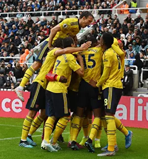 Aubameyang's Stunner: Monreal Celebrates Arsenal's Win at Newcastle United (2019-20)