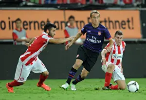 Olympiacos U19 V Arsenal U19 - NextGen 2012:13 Prints: Austin Lipman (Arsenal) Emmanouil Siopis and Dimitrios Voutsiotis (Olympiacos)