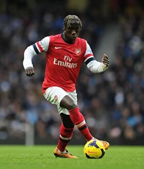 Manchester City Collection: Bacary Sagna in Action: Arsenal vs. Manchester City, Premier League 2013-14