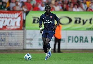 Bacary Sagna Collection: Bacary Sagna in Action: Arsenal's Dominance over Szombathelyi (5-0)