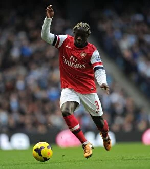 Manchester City Collection: Bacary Sagna in Action: Manchester City vs. Arsenal, Premier League 2013-14