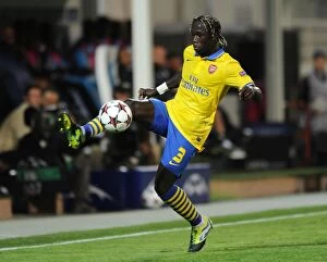 Images Dated 18th September 2013: Bacary Sagna in Action: Marseille vs. Arsenal, UEFA Champions League 2013-14
