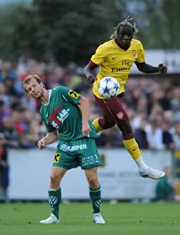 Images Dated 27th July 2010: Bacary Sagna (Arsenal) Bauer (Neusiedl). SC Neusiedl 0: 4 Arsenal, Sportzentrum Neusiedl