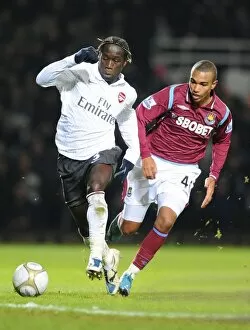West Ham United v Arsenal FA Cup 2009-10 Collection: Bacary Sagna (Arsenal) Bondz N Gala (West Ham). West Ham United 1: 2 Arsenal