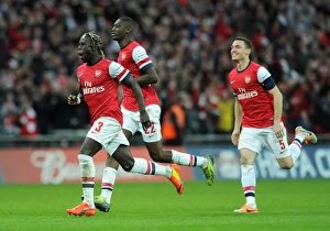 Images Dated 12th April 2014: Bacary Sagna (Arsenal) celebrates winning the penalty shoot out. Arsenal 1: 1 Wigan Athletic
