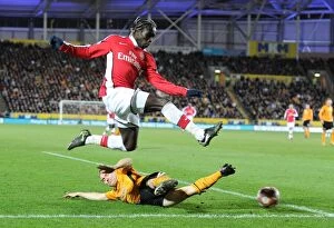 Images Dated 13th March 2010: Bacary Sagna (Arsenal) Dean Marney (Hull). Hull City 1: 2 Arsenal, Barclays Premier League
