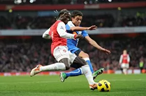 Arsenal v Wigan Athletic 2010-11 Collection: Bacary Sagna (Arsenal) Franco Di Santo (Wigan). Arsenal 3: 0 Wigan Athletic